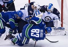 Scheifele, Brossoit lead Jets to 1-0 win over Canucks
