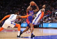 Paul George taking a hit to force an Offensive foul against Pistons