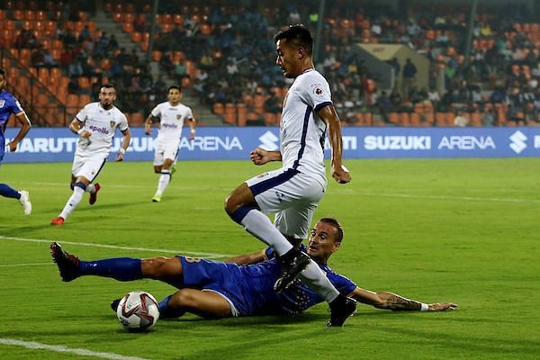 Lucian Goian puts in a sliding tackle [Image: ISL]