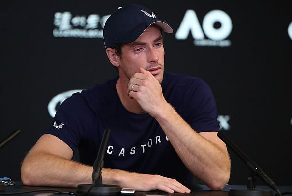 A sombre-looking Murray talks to the media while announcing his decision to retire