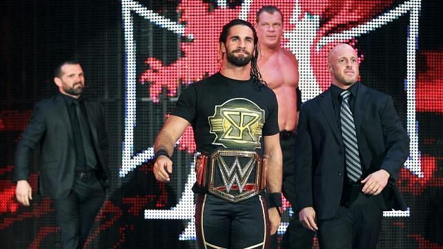 Rollins is shown alongside J&amp;J Security &amp; Kane whilst being part of The Authority.