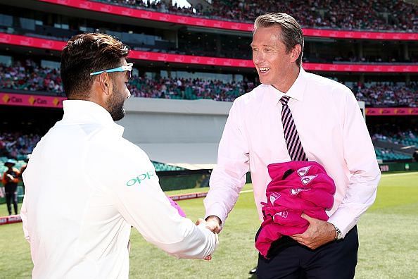 Rishabh Pant is exchanging a handshake with the legendary Glenn McGrath during the Pink Test