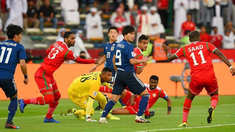 Oman in action against Japan at the Asia Cup (Image courtesy: AFC)