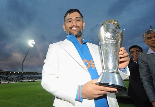 Dhoni with the Champions Trophy