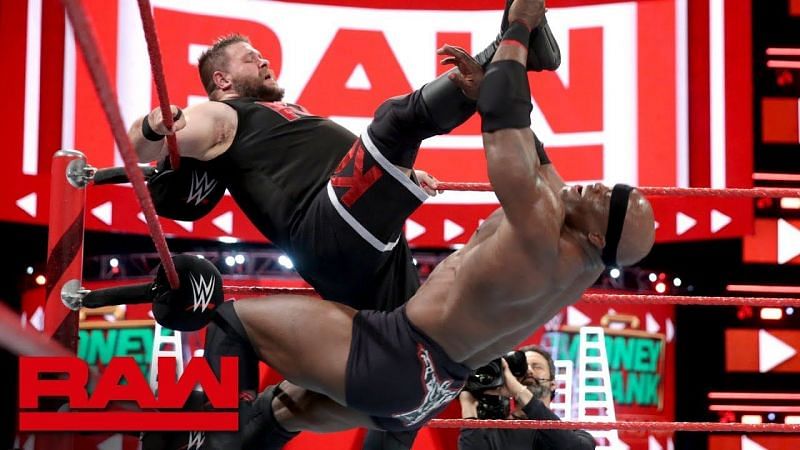 Owens fending off an attack from Lashley