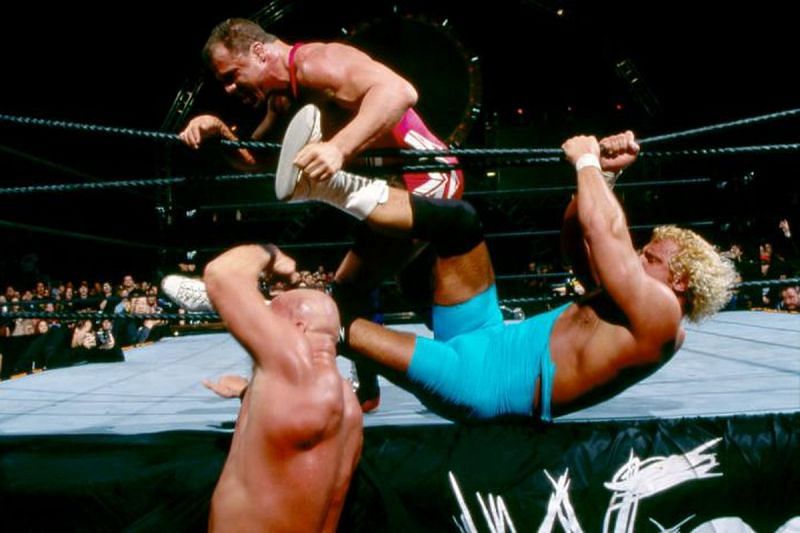 Angle battles Mr. Perfect and Steve Austin at the 2002 Rumble