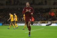 Van Dijk celebrates scoring his first league goal for Liverpool vs Wolves
