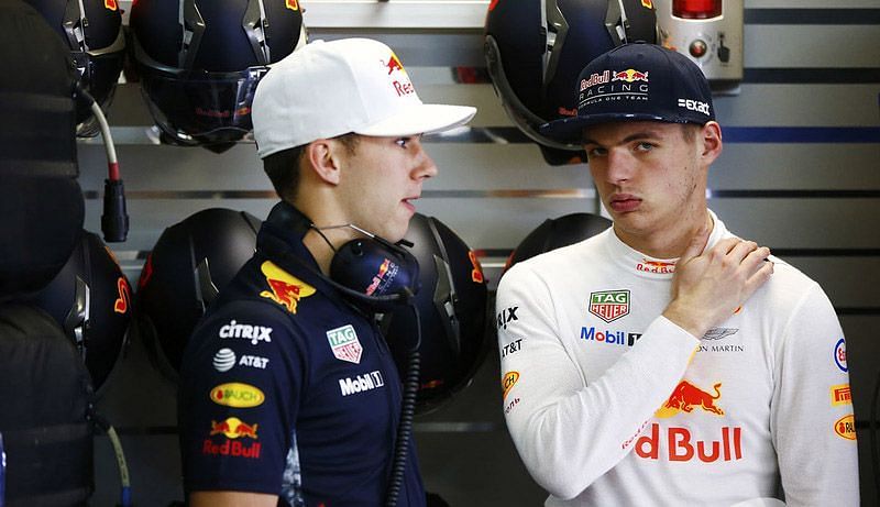 Verstappen with Gasly in the Red Bull garage