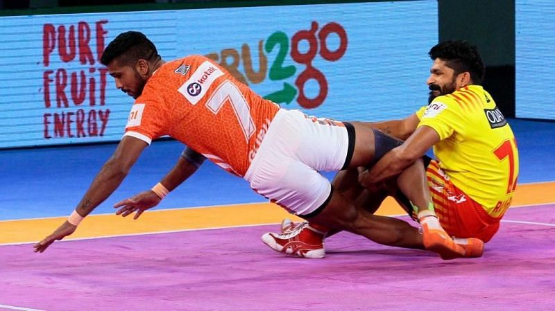 Koravi attempts a tackle on Pune's GB More