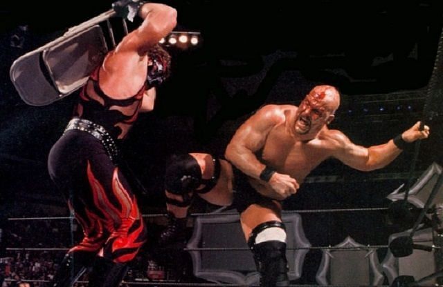 Stone Cold Steve Austin kicks Kane in the 2001 Royal Rumble