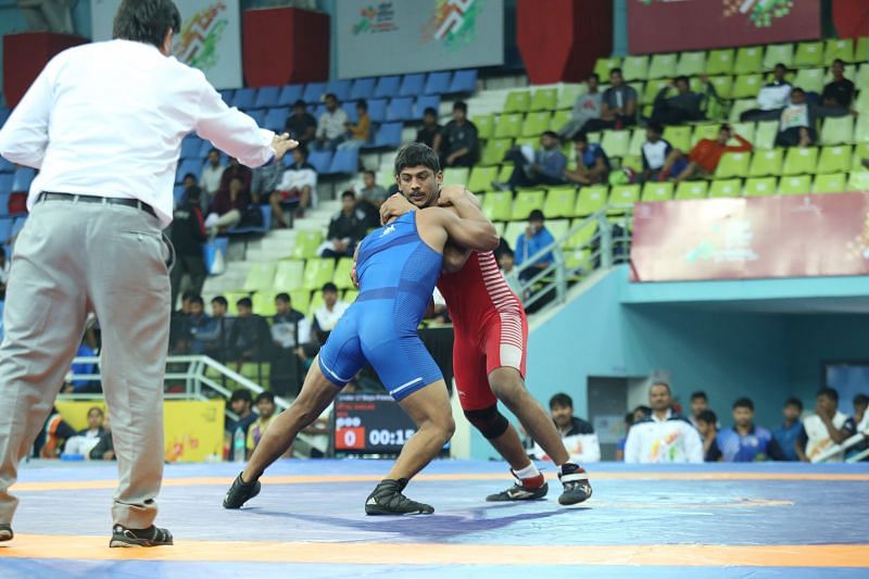 Maharashtra&#039;s Shelke Vetal [In Red] in action at Boys U-17 80kg freestyle category at Khelo India Youth Games