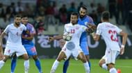 Sandesh Jhingan tries to win the ball from Mohammed Al-Romaihi