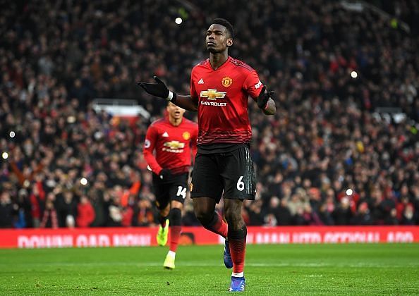 Pogba celebrates scoring a penalty v Brighton