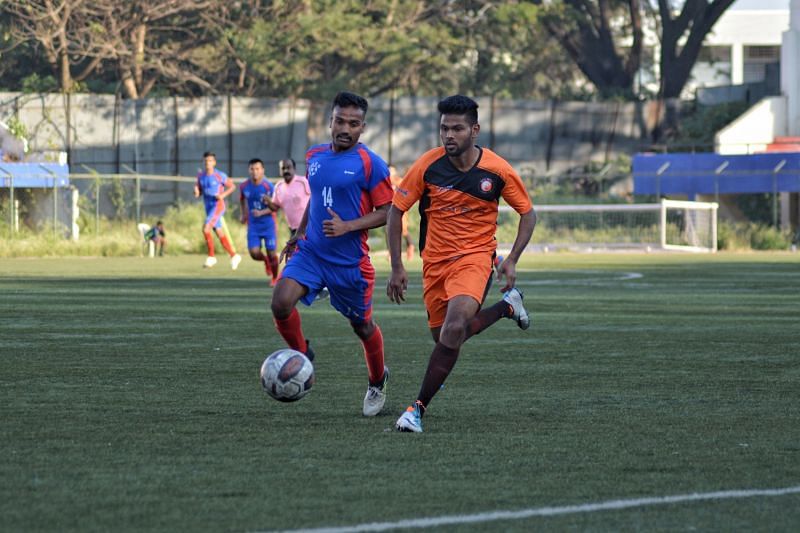 Rizwan Ali of South United FC competes for the ball against MEG