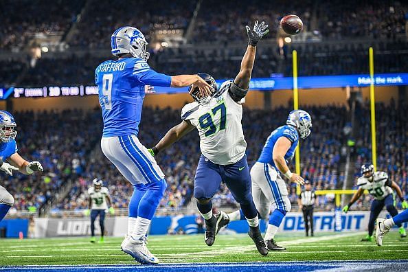 Poona Ford pressures Detroit Lions&#039; quarterback Matthew Stafford