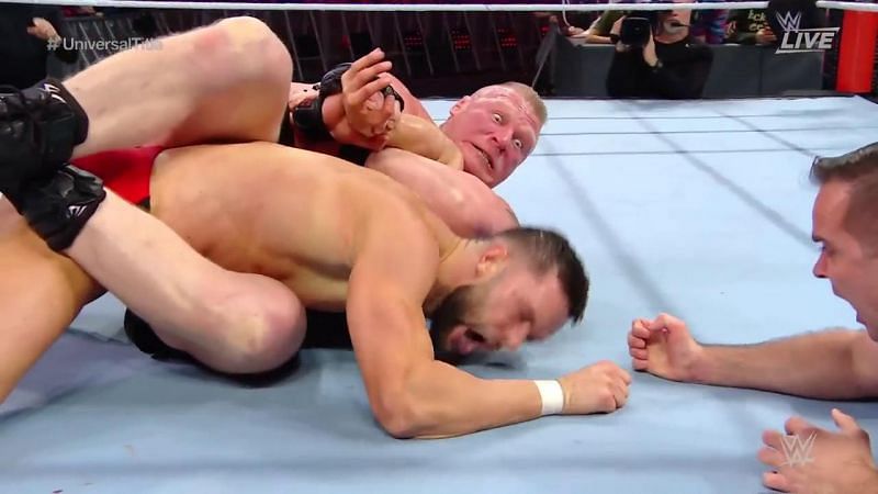 Finn Balor tapped out to the Kimura Lock.