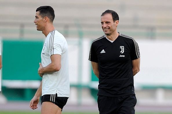 Cristiano Ronaldo trains as Allegri looks on