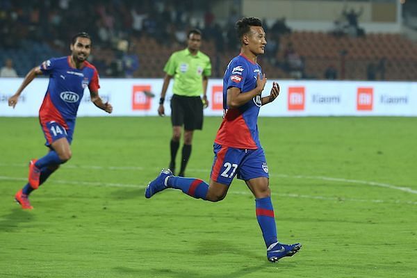 Chencho Gyeltshen of Bengaluru FC wheels away after scoring against NorthEast United