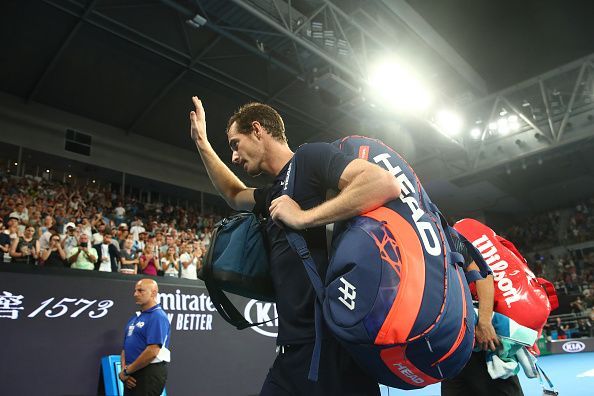 Murray waves goodbye to his fans as he leaves the Melbourne Arena