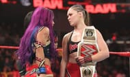 WWE Raw women's champion stares down Sasha Banks.
