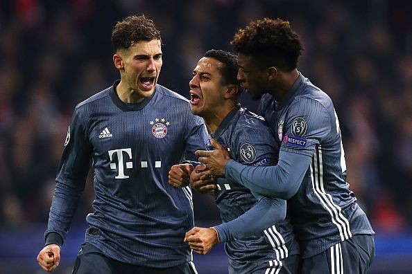 FC Bayern Muenchen players celebrate after scoring against Ajax in the UEFA Champions League Group E match