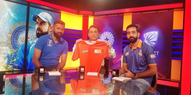 Players of Pro Volleyball League present Mumbai jersey to cricket legend Sunil Gavaskar