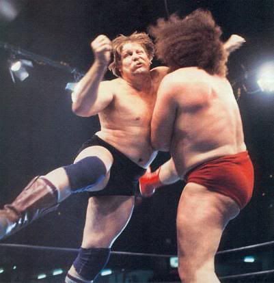 Stan Hansen decimates Andre the Giant with the Western Lariat.