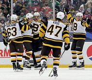 Pastrnak, Bruins beat Blackhawks 4-2 in Winter Classic