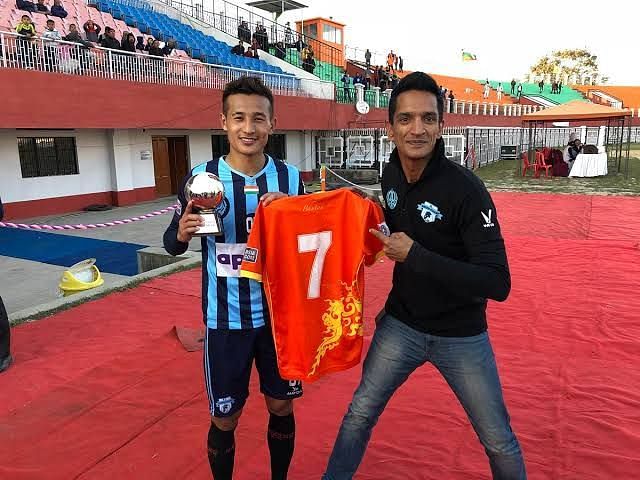 A file picture of Minerva Punjab owner Ranjit Bajaj with former player Chencho Gyeltshen (Image: Twitter)
