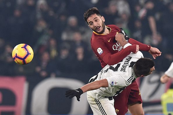 Kostas Manolas in action against Juventus