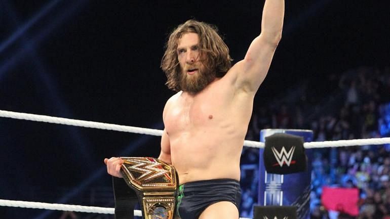 The New Daniel Bryan is shown holding the WWE Champion