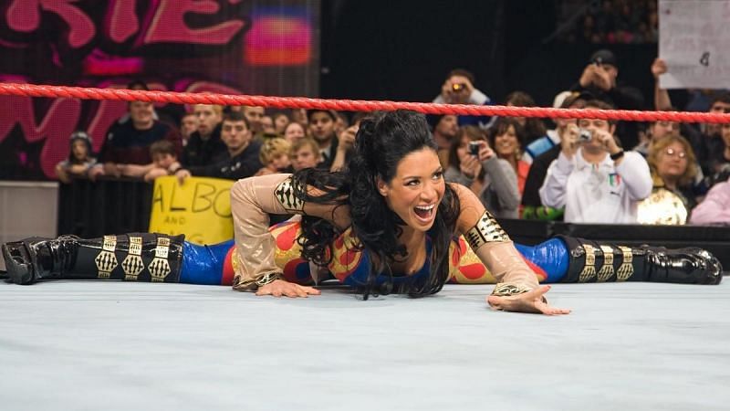 Melina makes her entrance on RAW, where she held the WWE Women&#039;s Championship and the Diva&#039;s Championship.