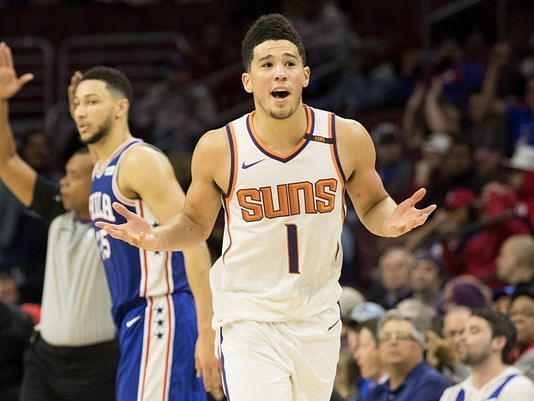 Devin Booker signed a five-year, $158 million maximum contract with the Suns.