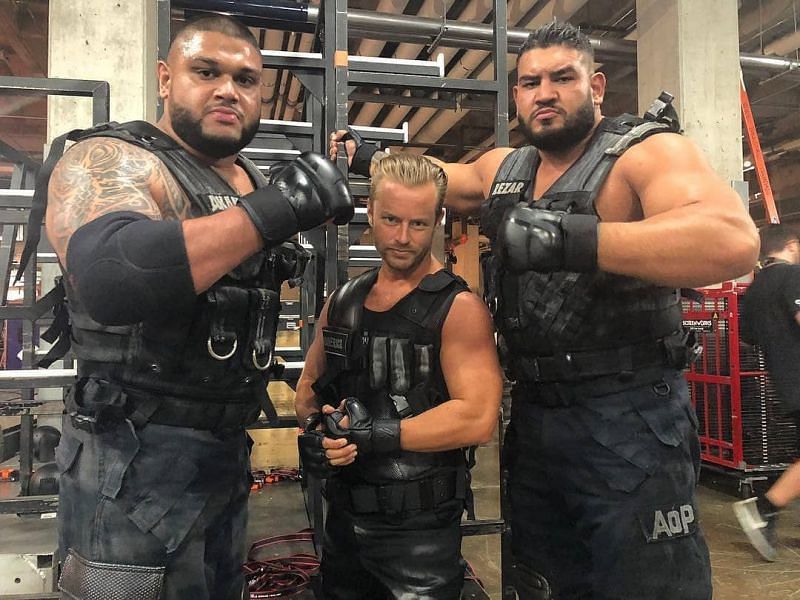 AOP are shown with their manager in Drake Maverick. (Source - WWE)