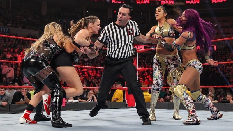 Sasha Banks and Bayley before facing Ronda Rousey and Natalya.