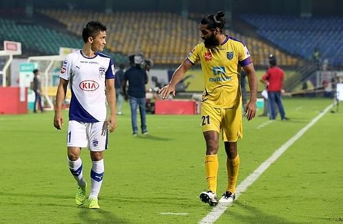 Sunil Chhetri (left) of Bengaluru FC with Sandesh Jhingan of Kerala Blasters