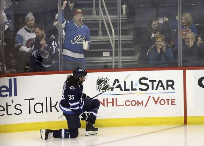 Wheeler, Scheifele help Jets beat Avalanche 7-4