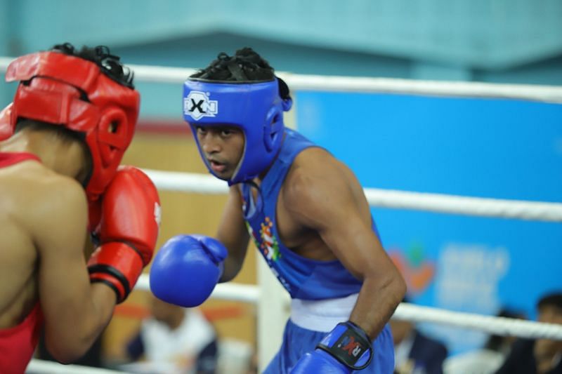 Bhavesh Kattimani (in blue) from Maharashtra in action during under-21 boys 52kg class bout at Khelo India Youth Games