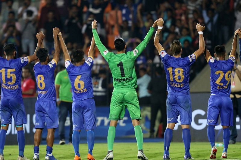 Mumbai City celebrate with their fans