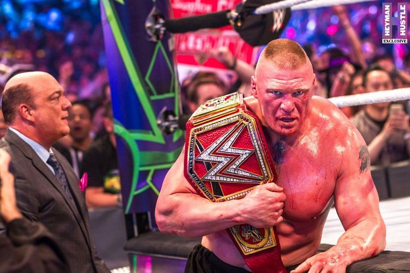 Lesnar, with Paul Heyman, after retaining the Universal Championship.