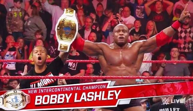 Lashley is shown winning the Intercontinental Champion with Lio Rush by his side.
