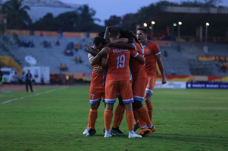Chennai City players celebrate after a goal