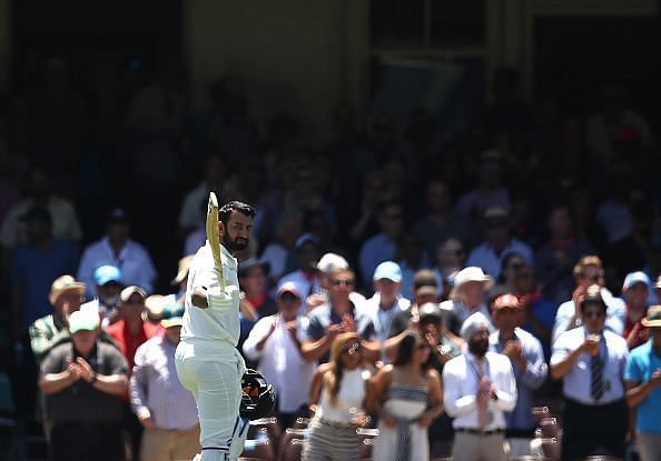 Cheteshwar Pujara walking back to the pavilion after scoring 193 at Sydney Cricket Ground