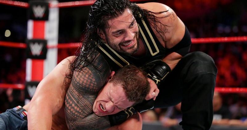 Roman Reigns and John Cena in action