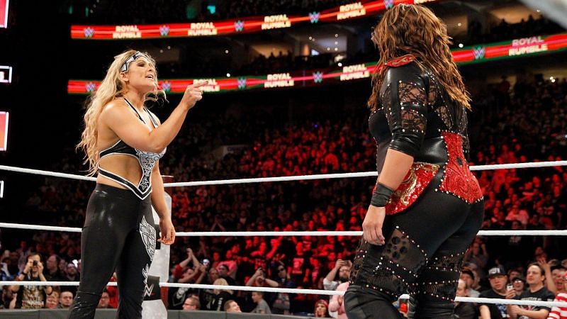 Beth Phoenix and Nia Jax, two of the most dominant women in history, battling as the fans were chanting 