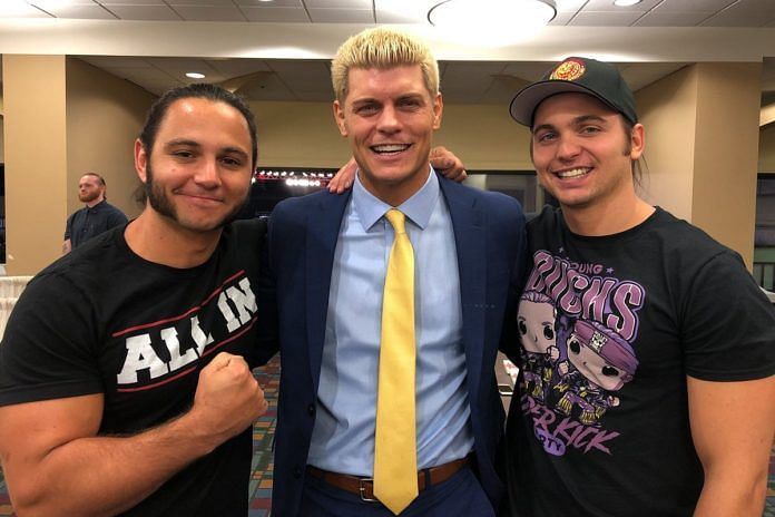 Cody Rhodes flanked by the Young Bucks.