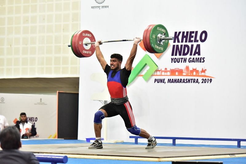 Gold Medalist Baldev Guru (Punjab) in action during U-21 boys 81kg weightlifting category at Khelo India Youth Games