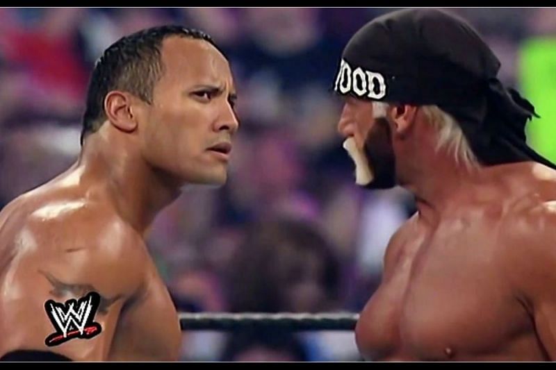 The Rock seems perplexed that he is being booed, while the villain, Hogan, has the crowd&#039;s support