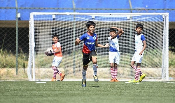 Action from the Boost-BFC Inter-School Soccer Shield