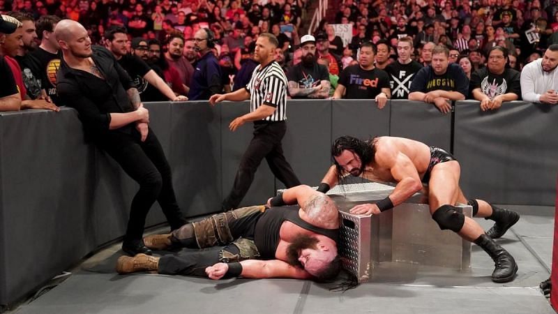 Drew McIntyre and Baron Corbin attack Braun Strowman on Raw.
